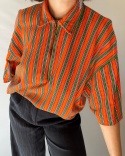 T-shirt polo w paski